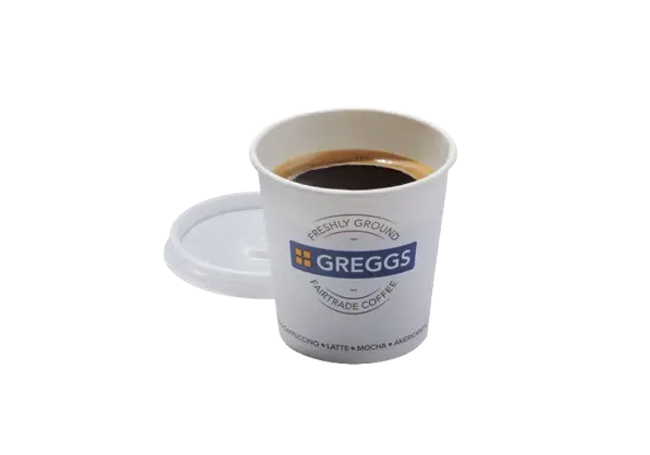 Greggs Espresso Excellence: Crafting Bold Flavors from Bean to Cup 2 A freshly brewed Greggs espresso served in a small white cup.