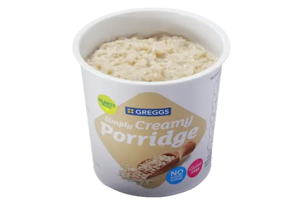Sausage Breakfast Roll Simply Creamy Porridge: A warm pot of Greggs Simply Creamy Porridge, smooth and comforting with a rich, milky texture – perfect for a hearty breakfast."