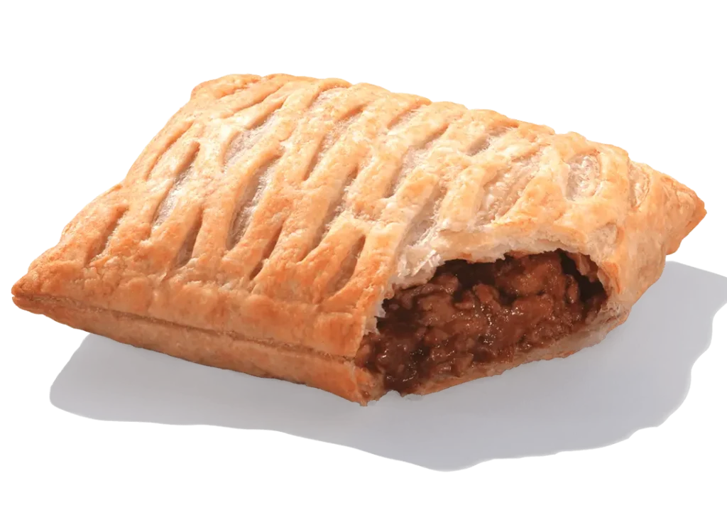 Greggs Vegan Lattice Steak-Free – golden flaky pastry filled with Quorn pieces, onion, and rich vegan gravy.
