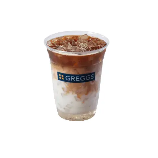 Greggs Menu And Updated Prices In UK 2025 62 Here’s a **1.5-line alt text** for **Iced Vanilla Latte**:
**Alt text:**
*A glass of iced vanilla latte with swirling layers of espresso and milk, packed with ice and a smooth, creamy finish on top.*